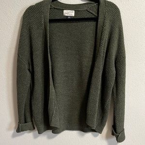 Green open front sweater